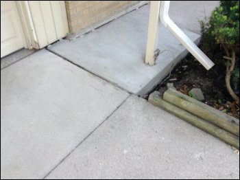 Concrete Sidewalk Repair of Busted-up Sidewalk