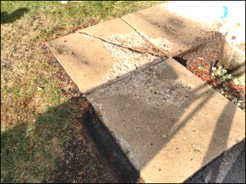 Small Concrete Sidewalk Before Repair