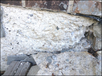 Concrete Slab Deterioration Below Brick, Before Repair, Photo 1